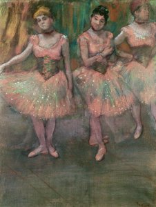 Dancers wearing salmon coloured skirts